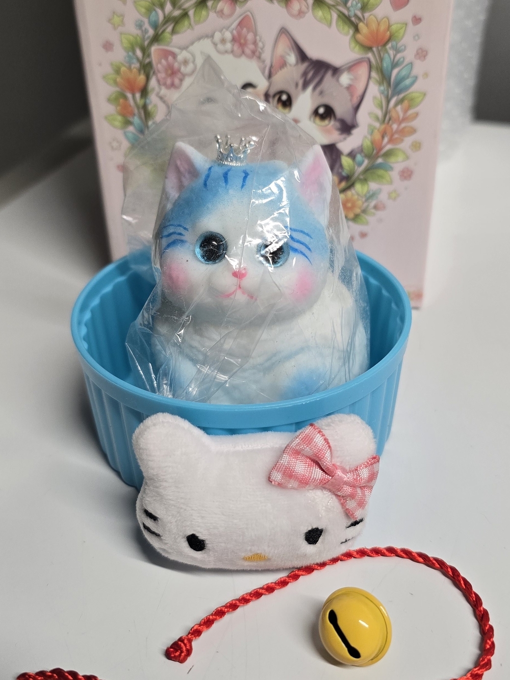 Blue & White Kitty Squishy with Crown in Blue Dish